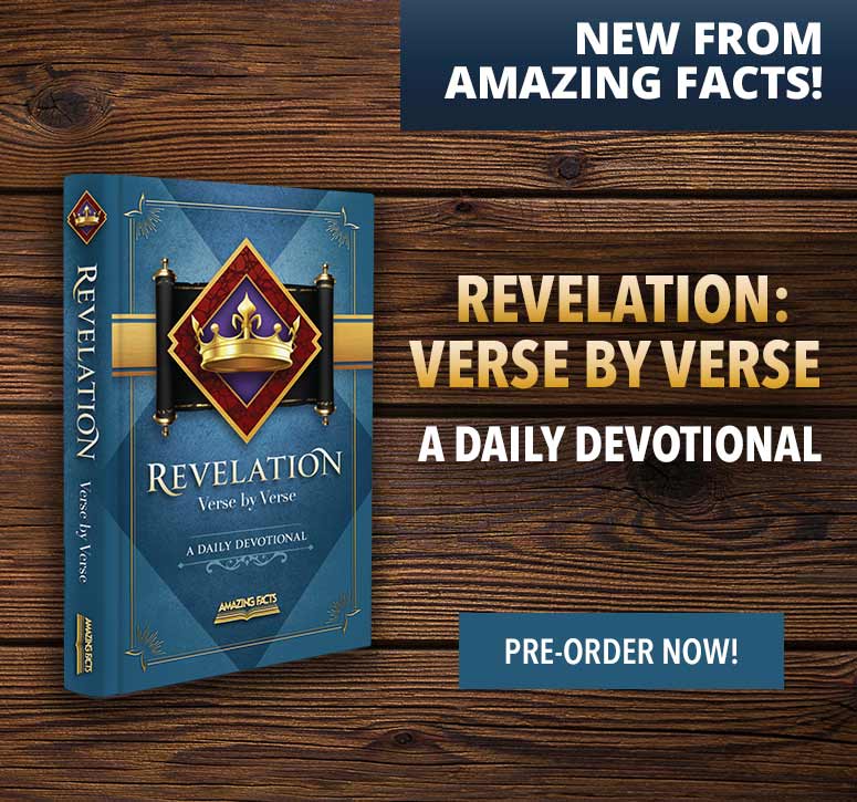 Revelation devotional book on wood plank background