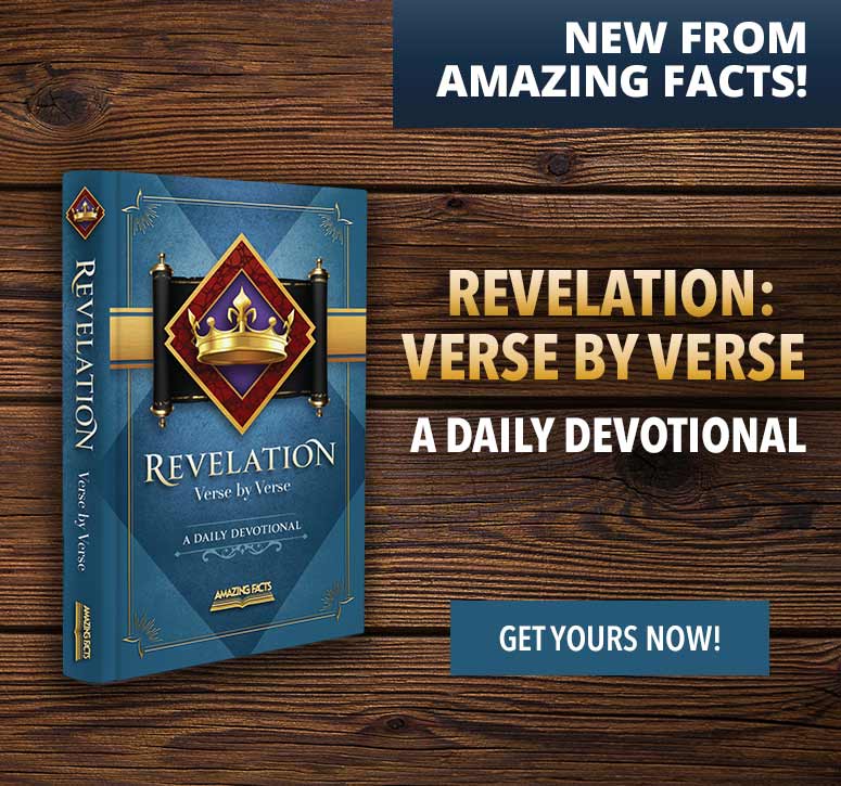Revelation devotional book on wood plank background
